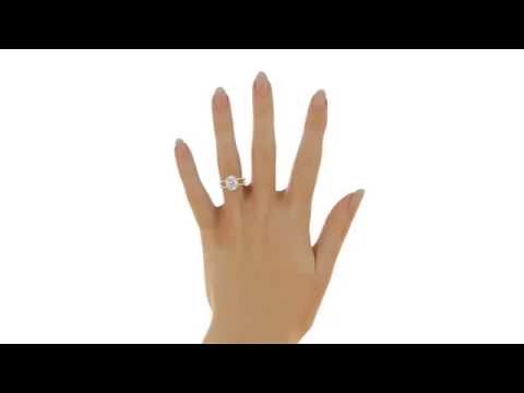 Oval Cut Diamond Engagement Ring Halo Split Shank 18k Yellow Gold on a finger