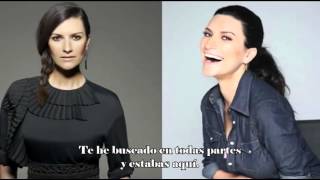 Laura Pausini-En la puerta de al lado (letra)-