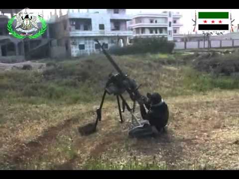 التصدي للطيران الحربي بالدوشكا في الكرك الشرقي في ريف درعا من قبل لواء الشهيد عماد نصر الله