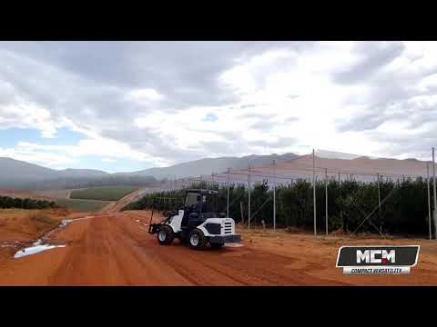 Driving behind the CL50 COMPACT MULTI-FUNCTION LOADER on a Fruit Farm in South Africa