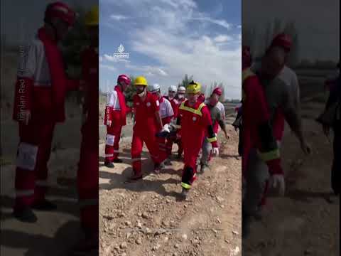 Rescuers aid wounded after strike on Iran railway line