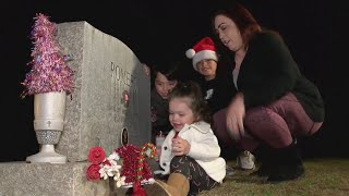Family visits grave of Hanford man killed in Christmas hit-and-run