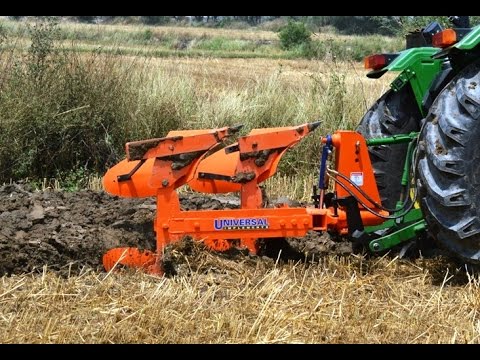 Reversible mould board plough