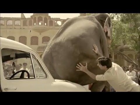 Peugeot 206 - Elephant Sits On Car - Advert Commercial