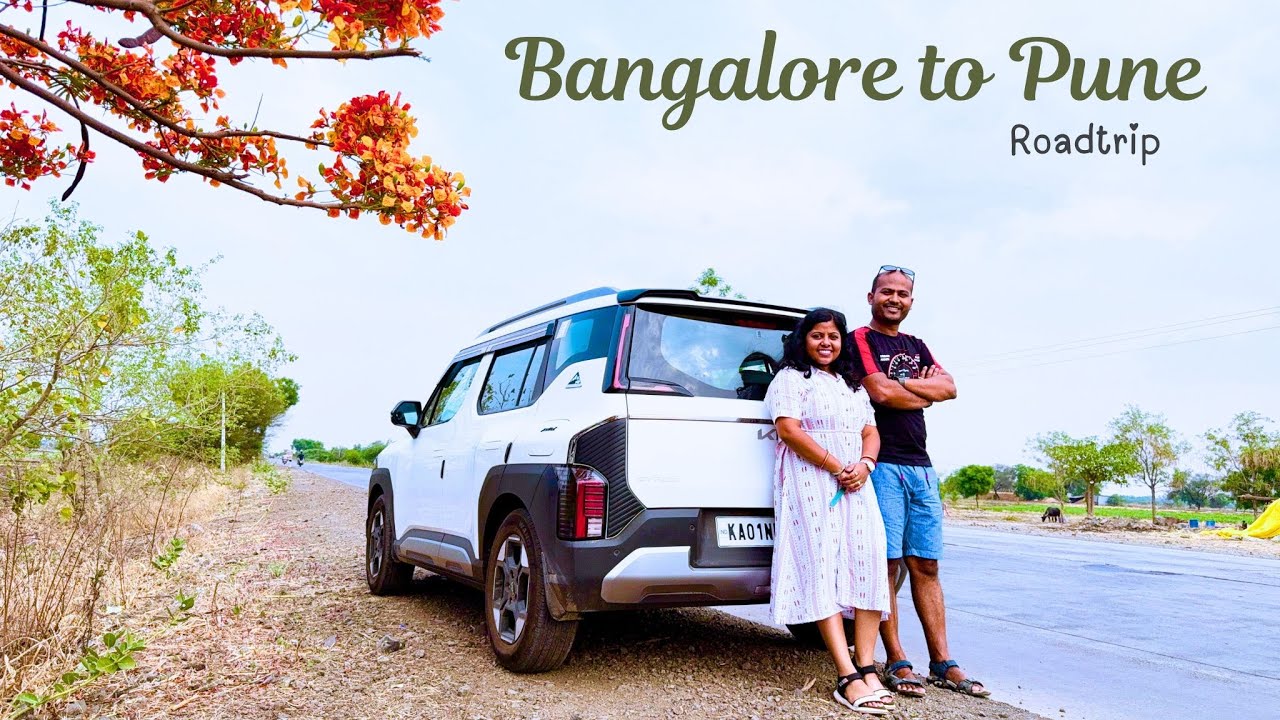 Bangalore to Pune Road Trip with Kia Syros – Scenic Drive Lined with Blooming Gulmohar Trees 🌺