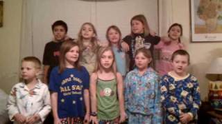 Alexis Noel and the Socky BFF's singing (Here Comes Santa Claus)