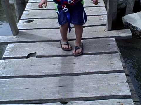 Giancarlo being careful not to fall off the dock.