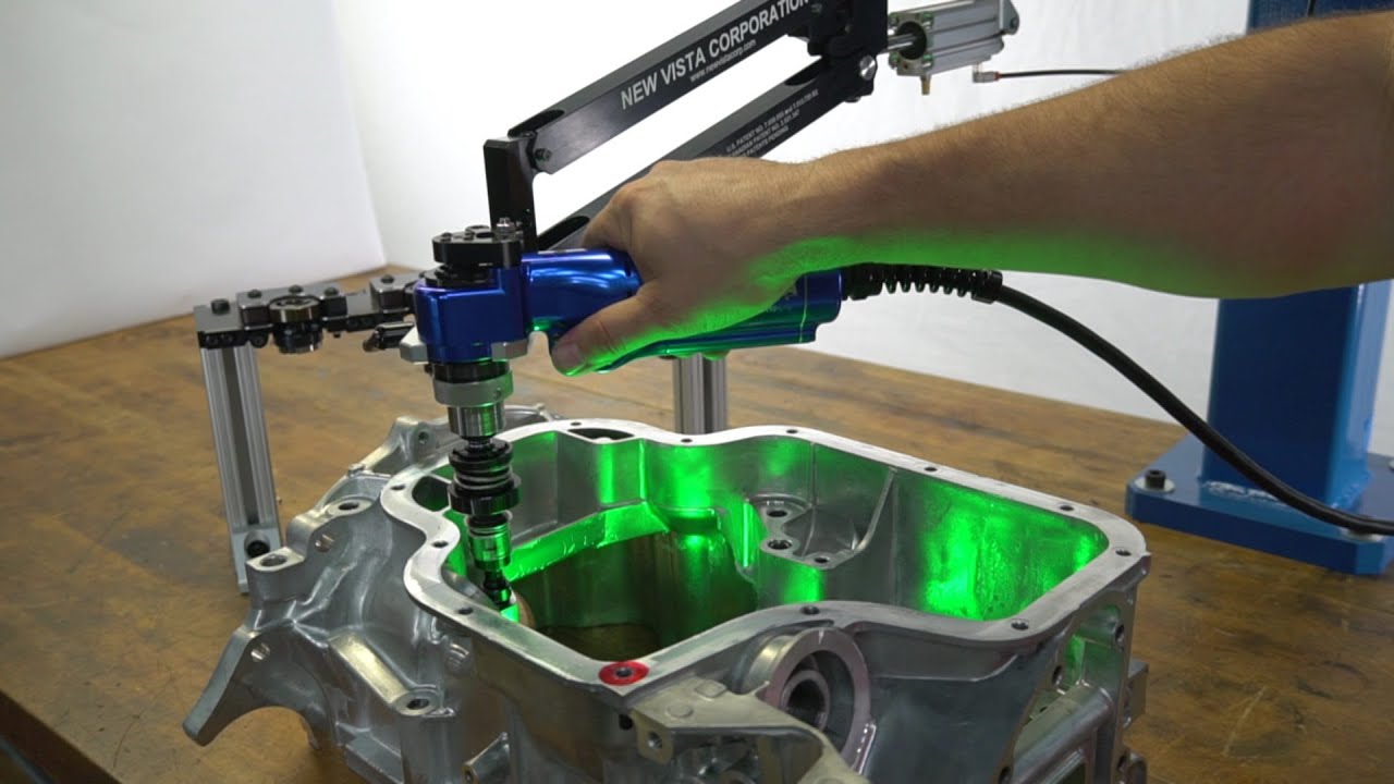 An SVX/HTU verifying threads in a crankcase – New Vista Corporation