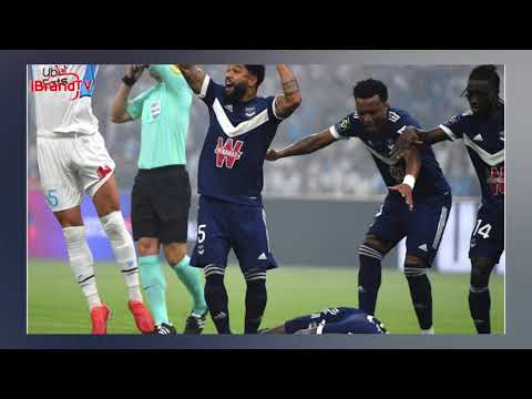 Bordeaux striker Samuel Kalu collapses on the pitch