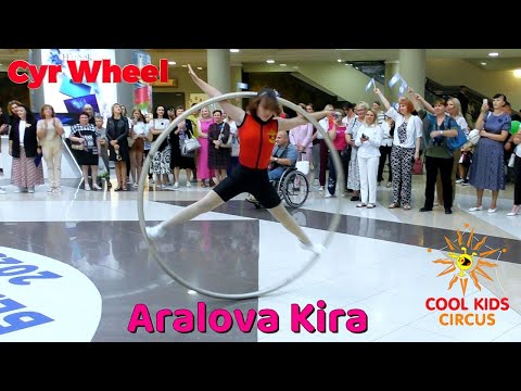 Demonstration performance at a charity evening, young acrobat "Cyr Wheel" Aralova Kira.
