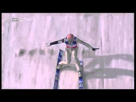 Manuel Fettner mit eine Ski zu Mannschaftgold