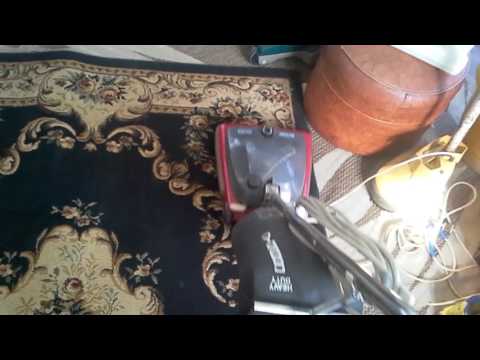 Vacuuming a rug using my Sanitaire sc684