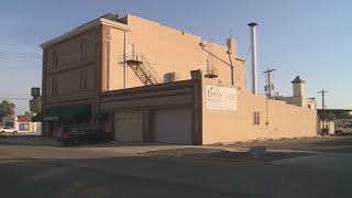 Davis Mortuary owners arrested 10 months after decomposing bodies found during inspection