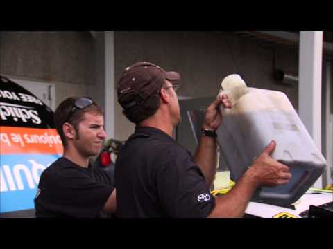 What role does oil play in a race car?