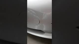 Tesla Model 3 tow screw cover removal process.