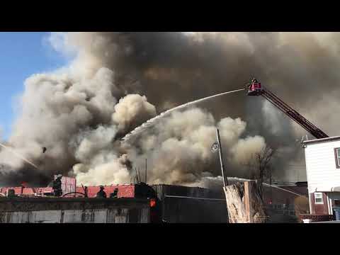 Smoky fire at Paterson business can be seen for miles