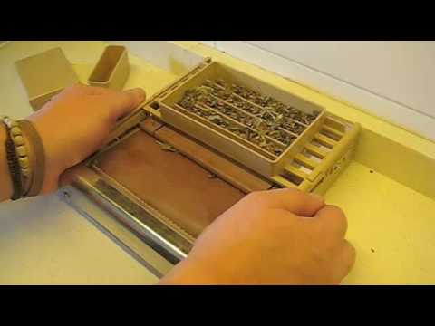 Máquina de liar cigarrillos "Filter-Matic" (EE.UU.)