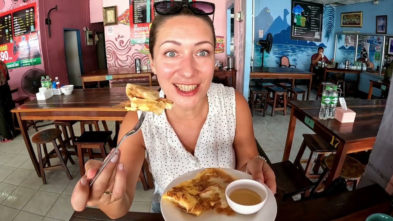 In the video, tourists are captivated as they traverse the enchanting Mangrove Walkway.