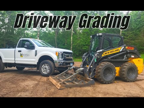 Grading a gravel driveway with the land plane skid loader