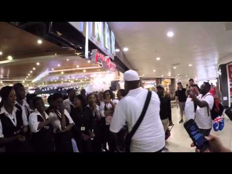 Dave Koz and Javier Colon perform "The Dance" for waitstaff at Diner in Tambo International Airport