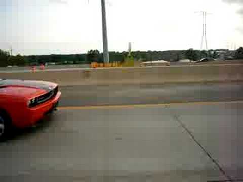 new dodge challenger srt8 drive by on the highway
