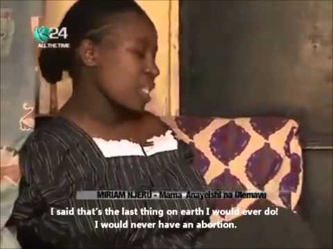 Kenyan Woman without arms takes care of baby [English subtitles]