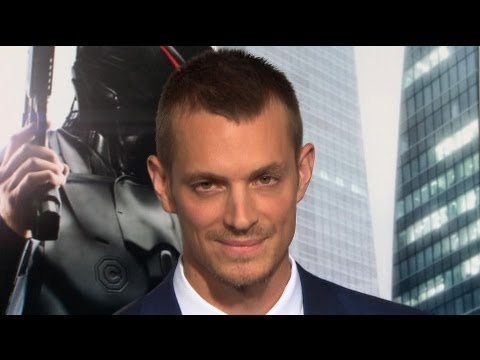 Olivia Munn & Joel Kinnaman at the Robocop Premiere