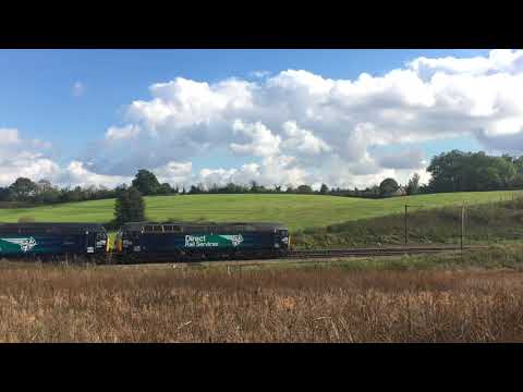 DRS 57002 and 57007 drone past Brantham with 0Z60