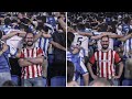 An Athletic Club fan kept smiling while Real Sociedad supporters did the Poznan around him😍