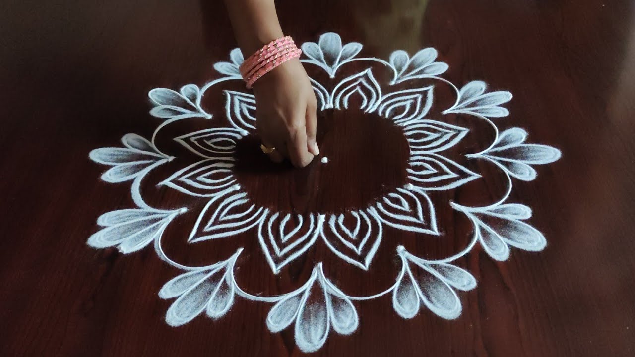 Creative easy dotted kolam with 3 dots by sresta