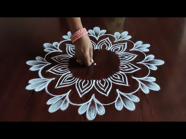 Creative easy dotted kolam with 3 dots by sresta