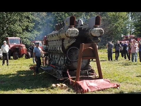 A huge GM EMD (Electro Motive Division) V12 two stroke engine is running