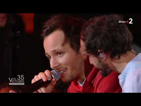 Videoclip de Allez reste (Live) — Les Enfoirés