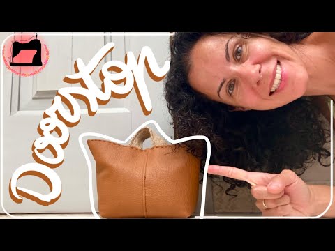 Sewing a faux leather doorstop.