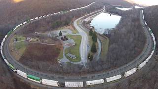 preview picture of video 'Aerial Video - Horseshoe Curve, Altoona, PA - Norfolk Southern Train Approaching'