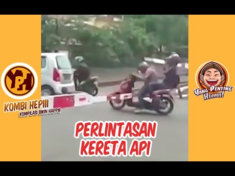 kombi-heppiii-pelintasan-kereta-api