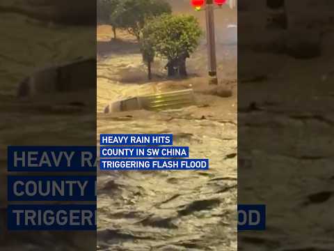 Heavy rain hits county in southwest China, triggering flash flood