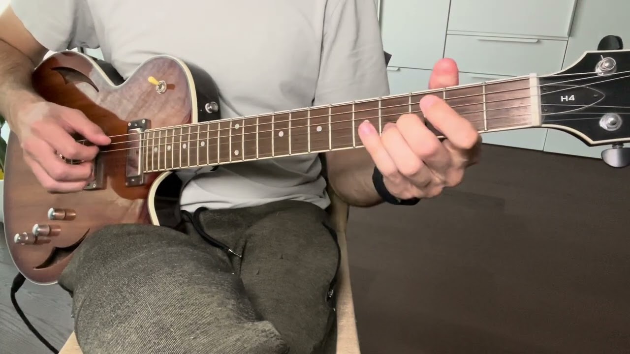 Roberto Barlocci playing the Pokémon main theme as a fingerstyle chord melody on solo guitar