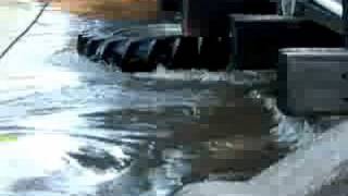 preview picture of video 'Rotating Tractor Tire, Columbus Junction, Flood 2008'