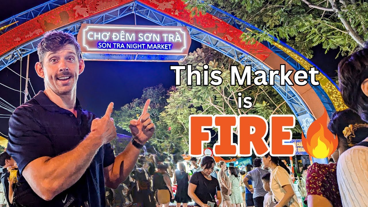 A tourist immerses themselves in the bustling energy of Son Tra Night Market, exploring colorful displays and unique souvenirs.