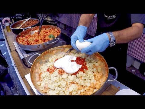 Italian Pasta 'Orecchiette' with 'Burrata' Cheese. Italy Street Food