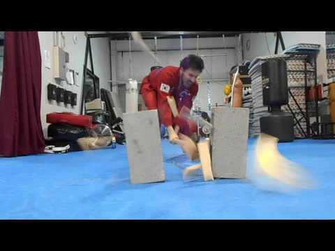 Smashing boards, cross grain.