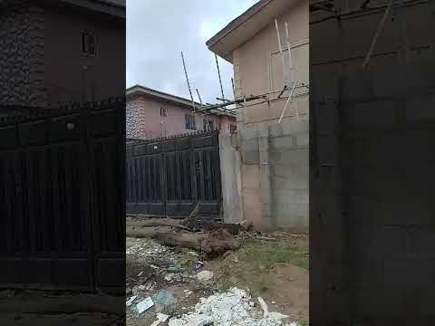 Half Plot of Land with 11 Room Self-Contained Units 📍 Location: Lanre Ayodeji Street, Off Memudu Bada Street, St. Mary Bus Stop, Governor's Road, Ikotun, Lagos