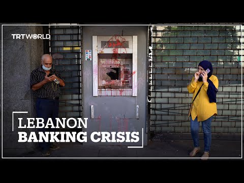 Lebanese lawmaker enters bank in Beirut to demand frozen savings