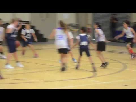 Shanna playing basketball vs. HFA