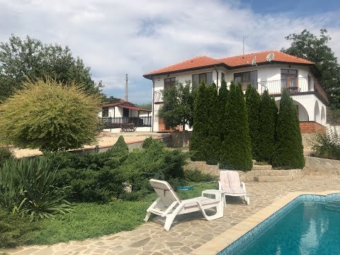 Two-storey house with swimming pool for sale in the village of Nikolaevka
