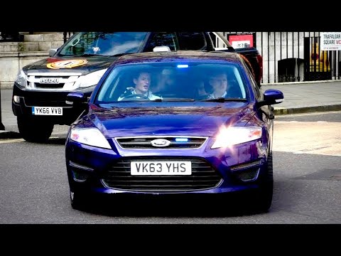 Ambulances and (Unmarked) Police cars Responding with Lights and sirens in London [Collection]