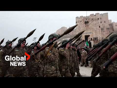 Syria marks 1st anniversary of al-Assad's fall with military parades