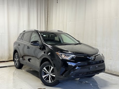 2018 Toyota RAV4 AWD LE in Black for sale at Park Mazda in Sherwood Park, AB