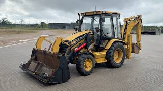 M&aacute;quina de ceifa Caterpillar 428C | Imagem 4 - Agroline